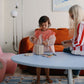 Child plays with Mushie Coin and Tube Sorting Set  - Original