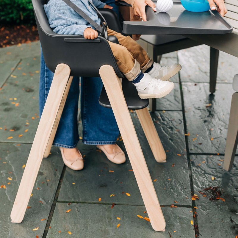 Baby sitting in UPPAbaby CIRO High Chair - JAKE (Charcoal)