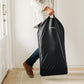 Dad carrying UPPAbaby MIRA 2-in-1 Bouncer and Seat in storage bag