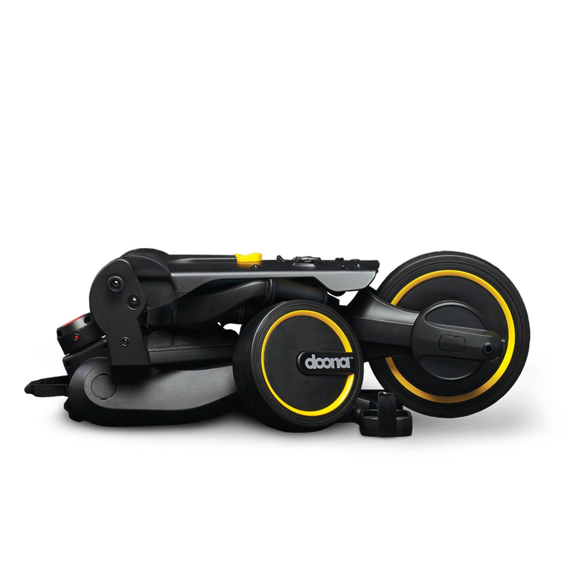 Doona Liki Trike folded to carry-on size — fits airline overhead bin and car trunk