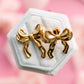 Pierced Co Jumbo Bows Earrings