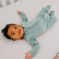 Baby wearing Copper Pearl Zip-up Footie - Briar