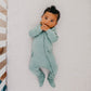 Baby wearing Copper Pearl Zip-up Footie - Briar