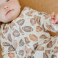 Baby wearing Copper Pearl Zip-up Footie - Blitz