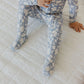 Little girl wearing Copper Pearl Zip-up Footie - Lacie