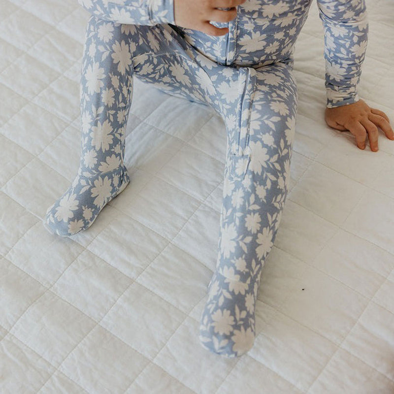 Little girl wearing Copper Pearl Zip-up Footie - Lacie