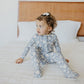 Little girl wearing Copper Pearl Zip-up Footie - Lacie