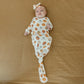 Baby wearing Copper Pearl Seasonal Newborn Knotted Gown - Karver