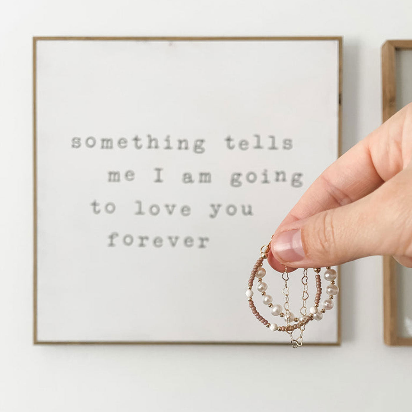 Woman holds Joyful Bead Company Hazelnut Bracelet