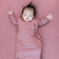 Baby wears Kyte Baby Sleep Bag - Dusty Rose - 2.5 Tog