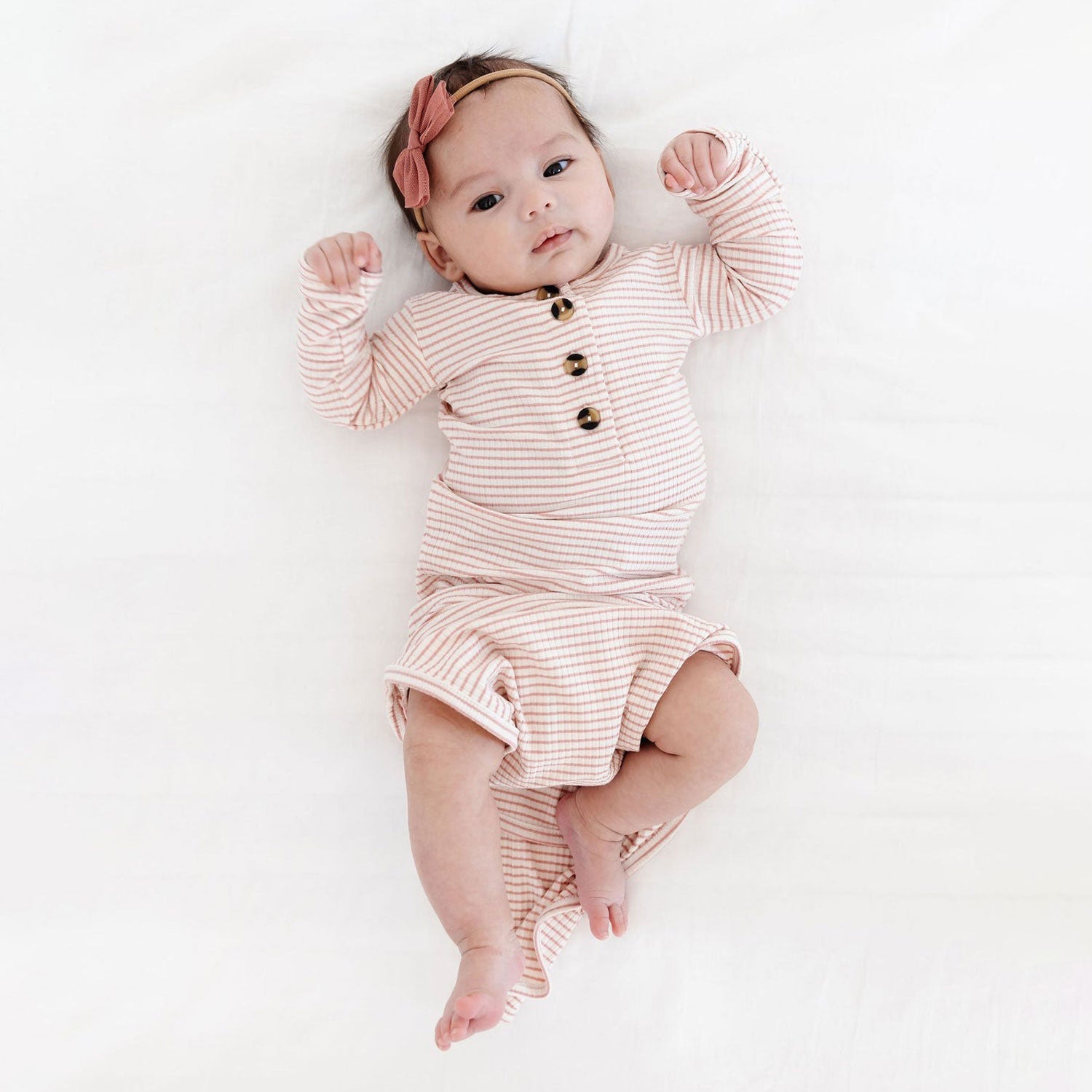 Baby wearing Lou Lou and Company Ribbed Knotted Gown - Hannah