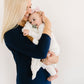 Mom holds baby wearing Lou Lou and Company Ribbed Top and Bottoms - Wren