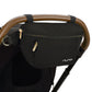 Nuna Sling Bag - Caviar attached to handlebar of stroller