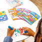 Little girl coloring OOLY  Undercover Art Hidden Pattern Coloring Activity Art Cards - Dog Days