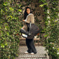 Mom carries baby in car seat of Nuna MIXX Next Stroller and PIPA Aire RX Car Seat Travel System - Caviar