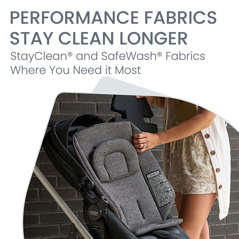 Mom cleans fabric of Britax Grove Modular Stroller - Pindot Onyx