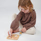 Child plays with Mentari Toys Cookie Cutting Set
