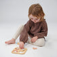 Child plays with Mentari Toys Cookie Cutting Set