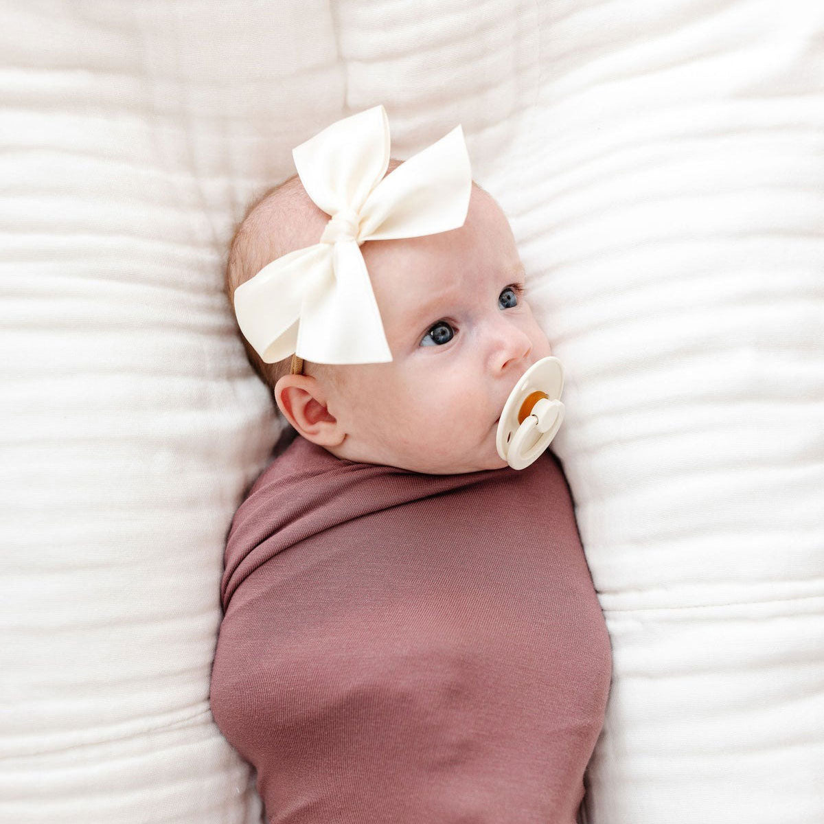 Baby girl wears Lou Lou and Company Satin Bow Headband - Large - Cream