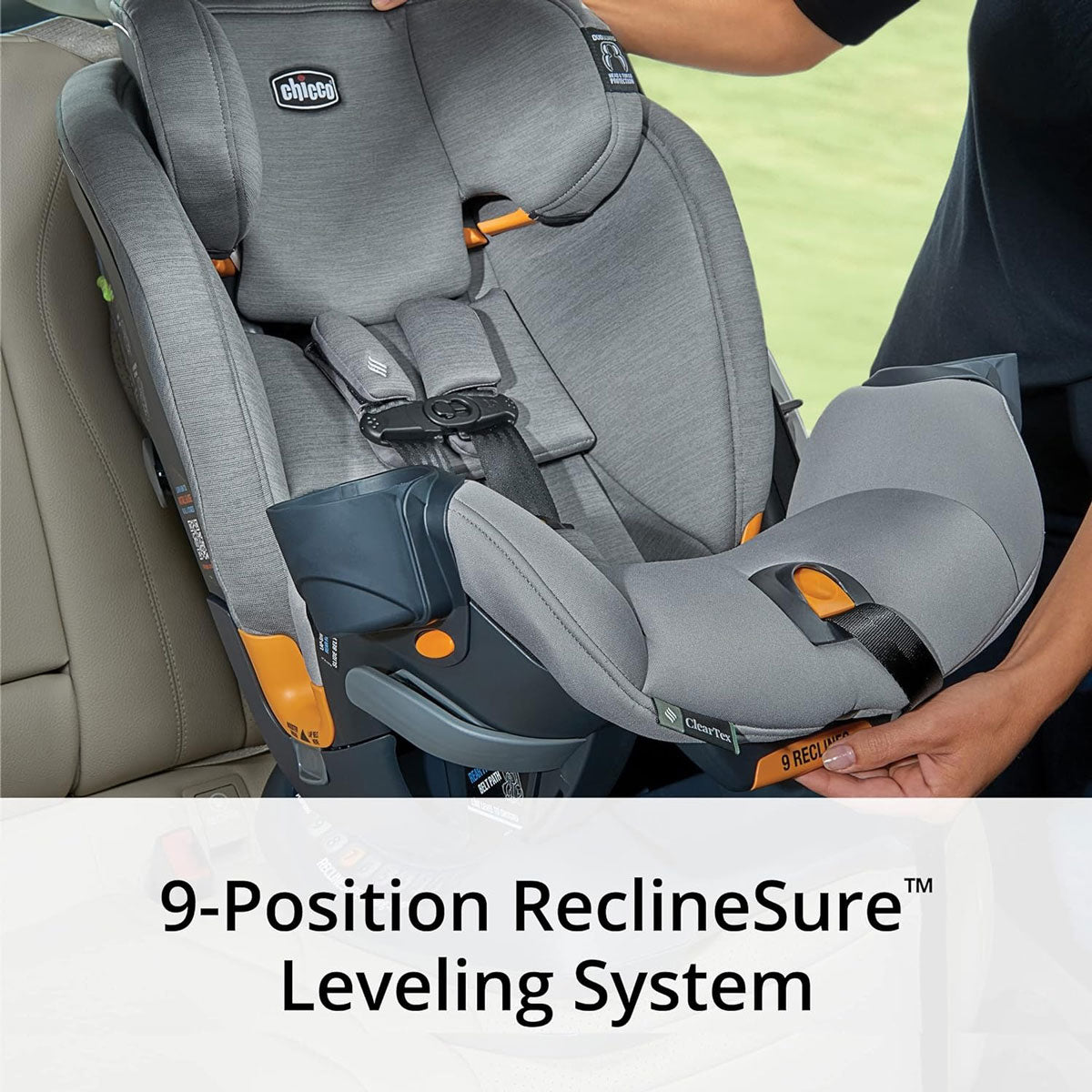 Mom adjusts recline of Chicco OneFit ClearTex All-In-One Car Seat - Drift