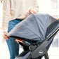 Woman extends canopy of Chicco Corso LE Modular Travel System - Hampton