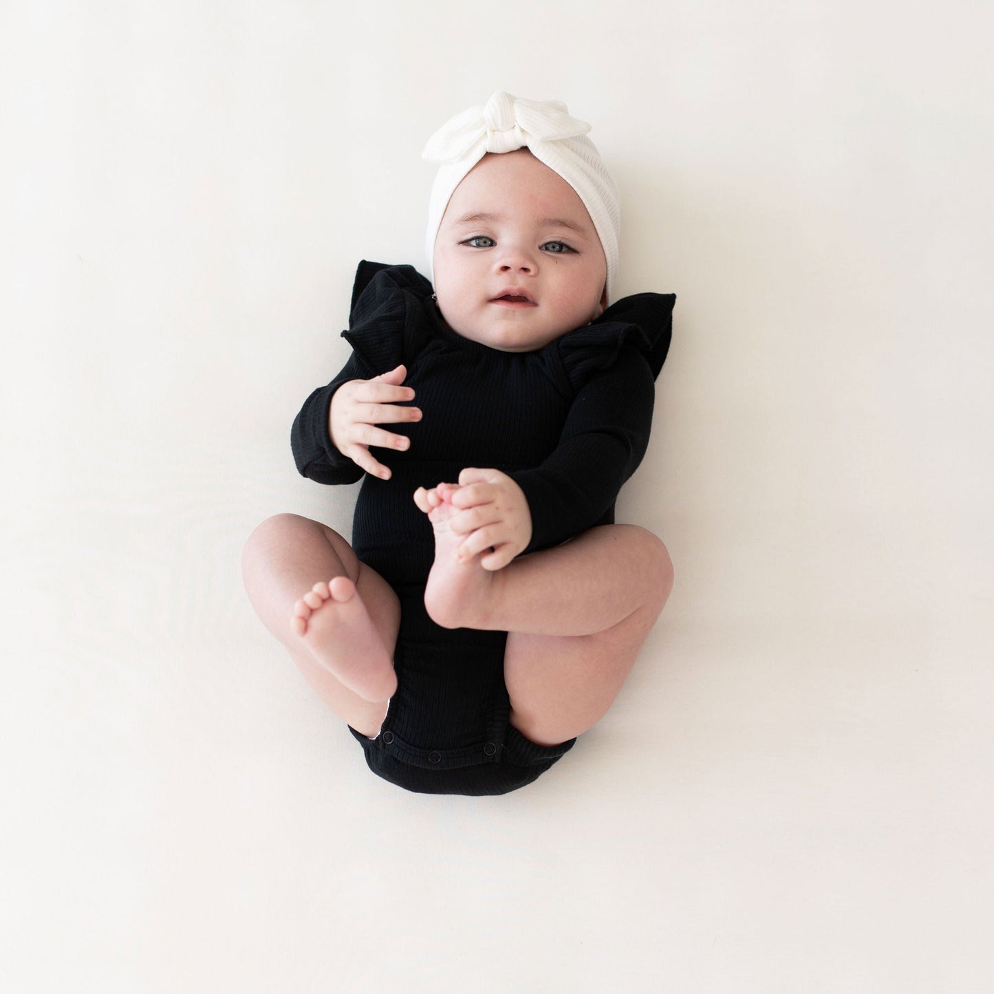 Kyte BABY Ribbed Long Sleeve Ruffle Leotard - Midnight
