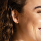 Woman smiles while wearing Made by Mary Gold Filled Mini Live In Hoop Earrings - Gold