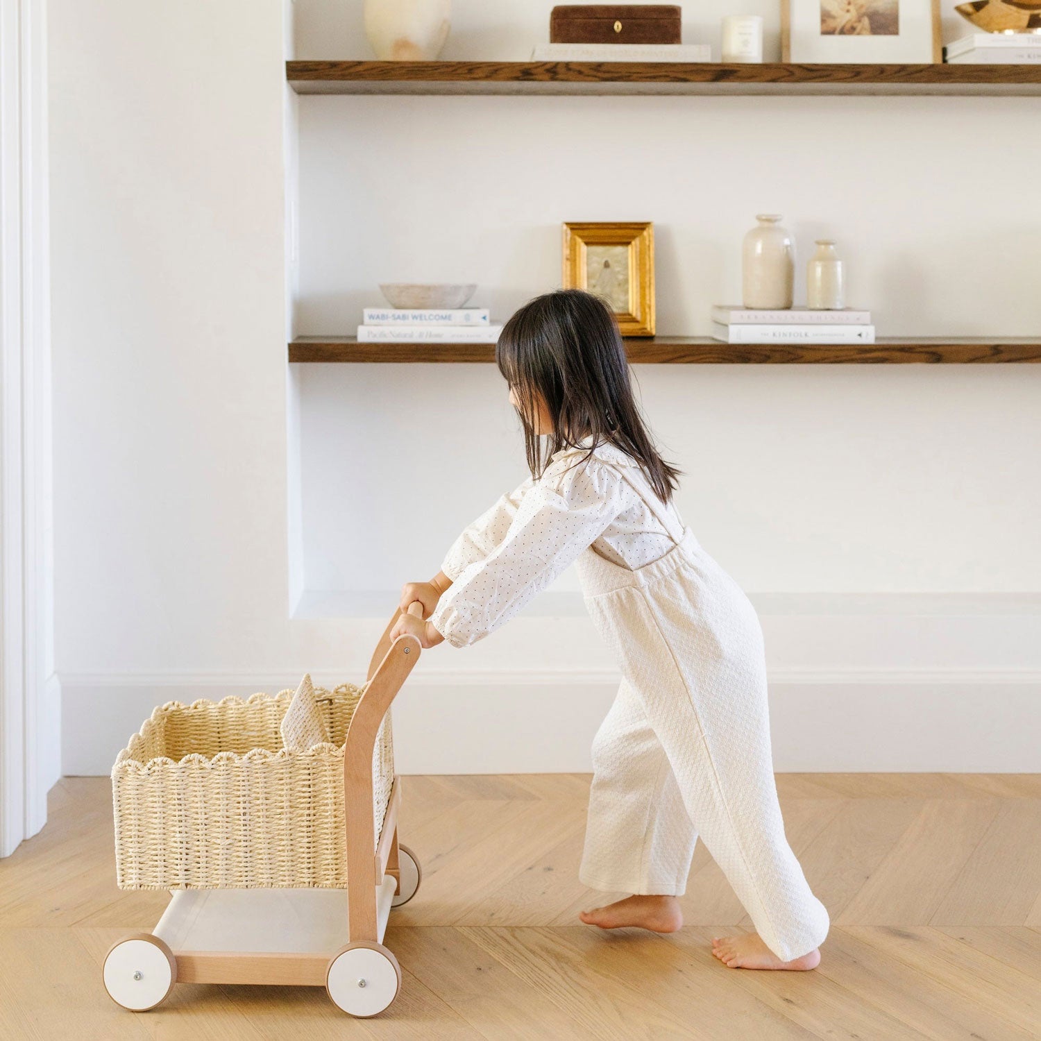 Girl pushes Gathre Shopping Trolley