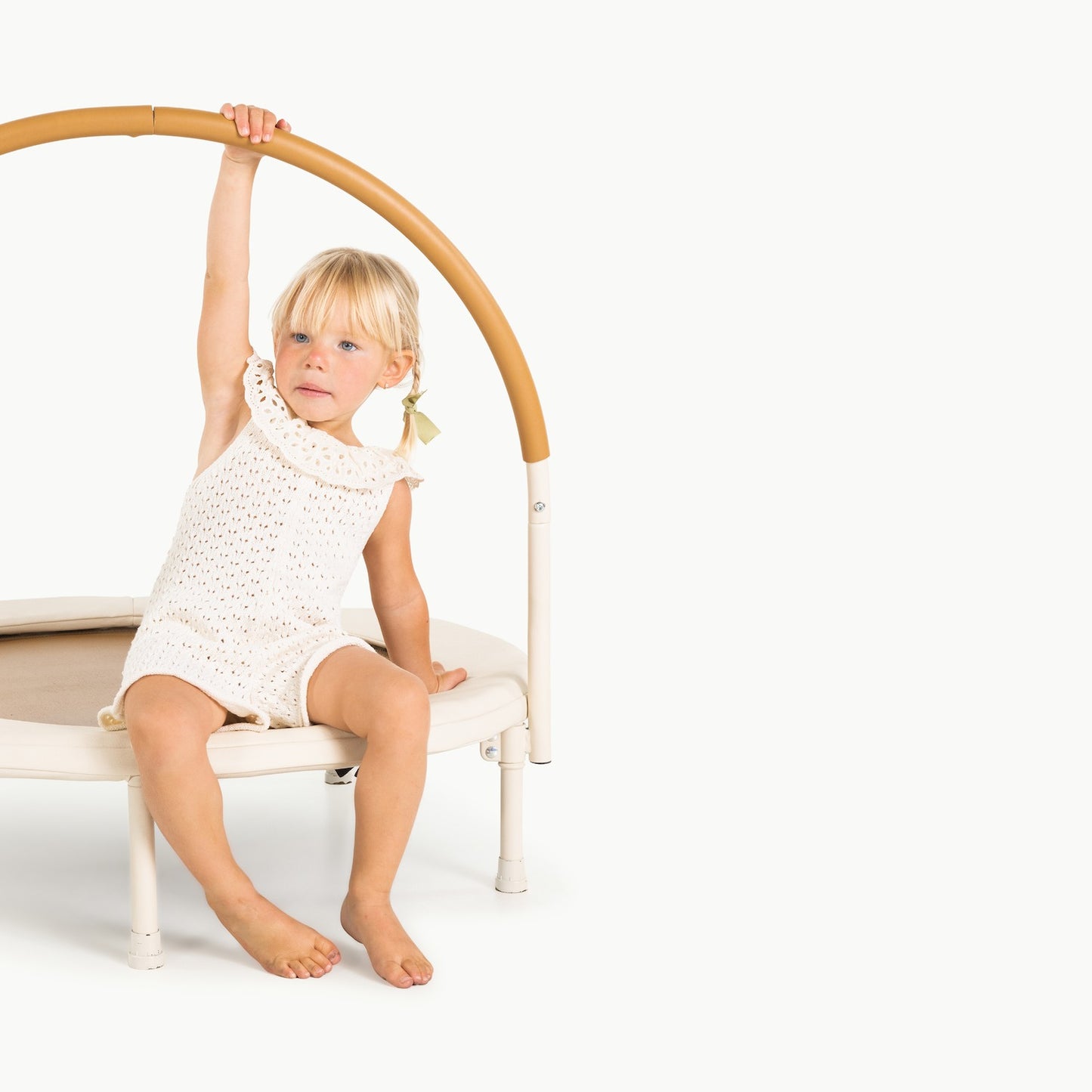 Little girl sits on Gathre Trampoline