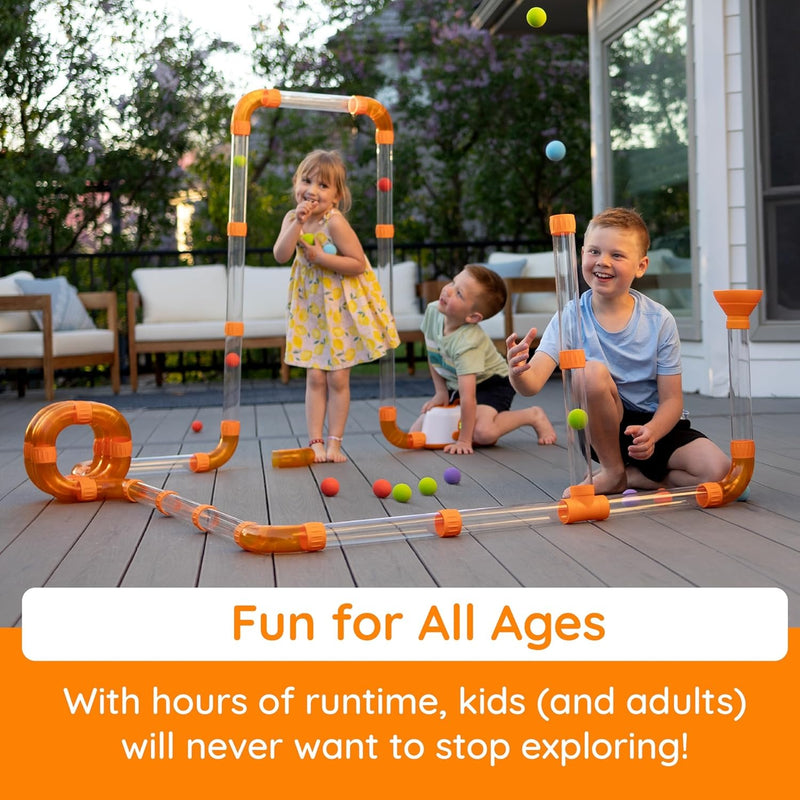 Three kids play outside with Fat Brain Toys Air Toobz