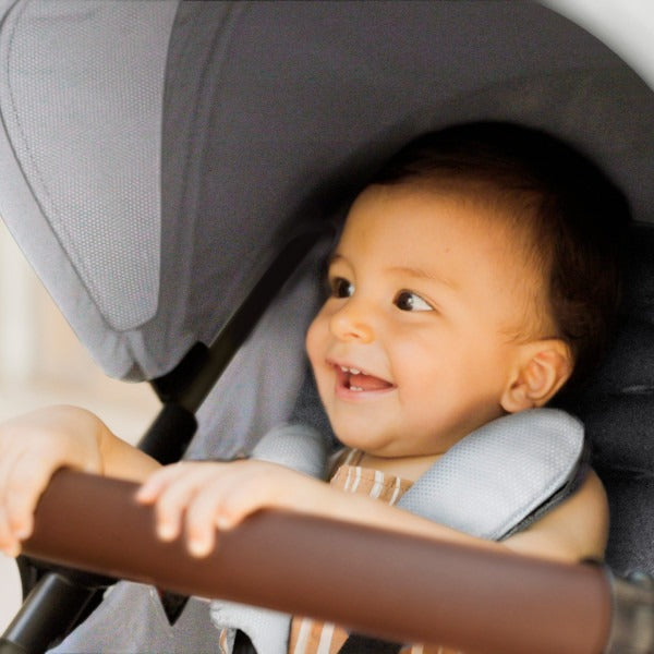 Baby rides in Maxi-Cosi Zelia2 Luxe+ 5-in-1 Travel System with Mico Luxe+ - Arctic Frost