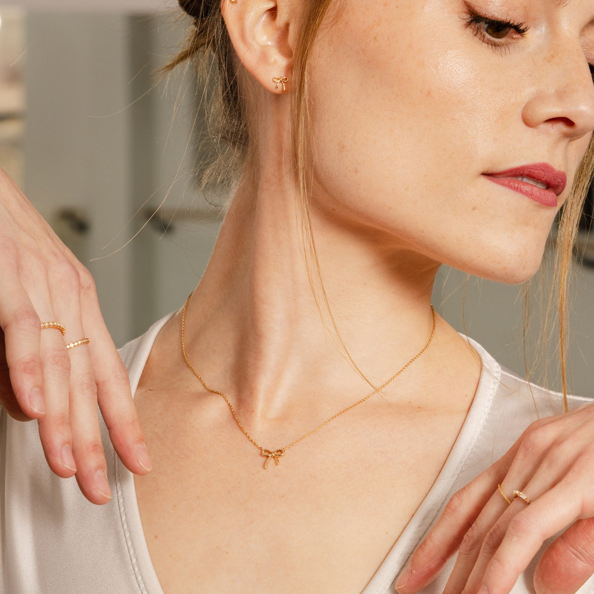 Woman wears Made by Mary Bow Necklace