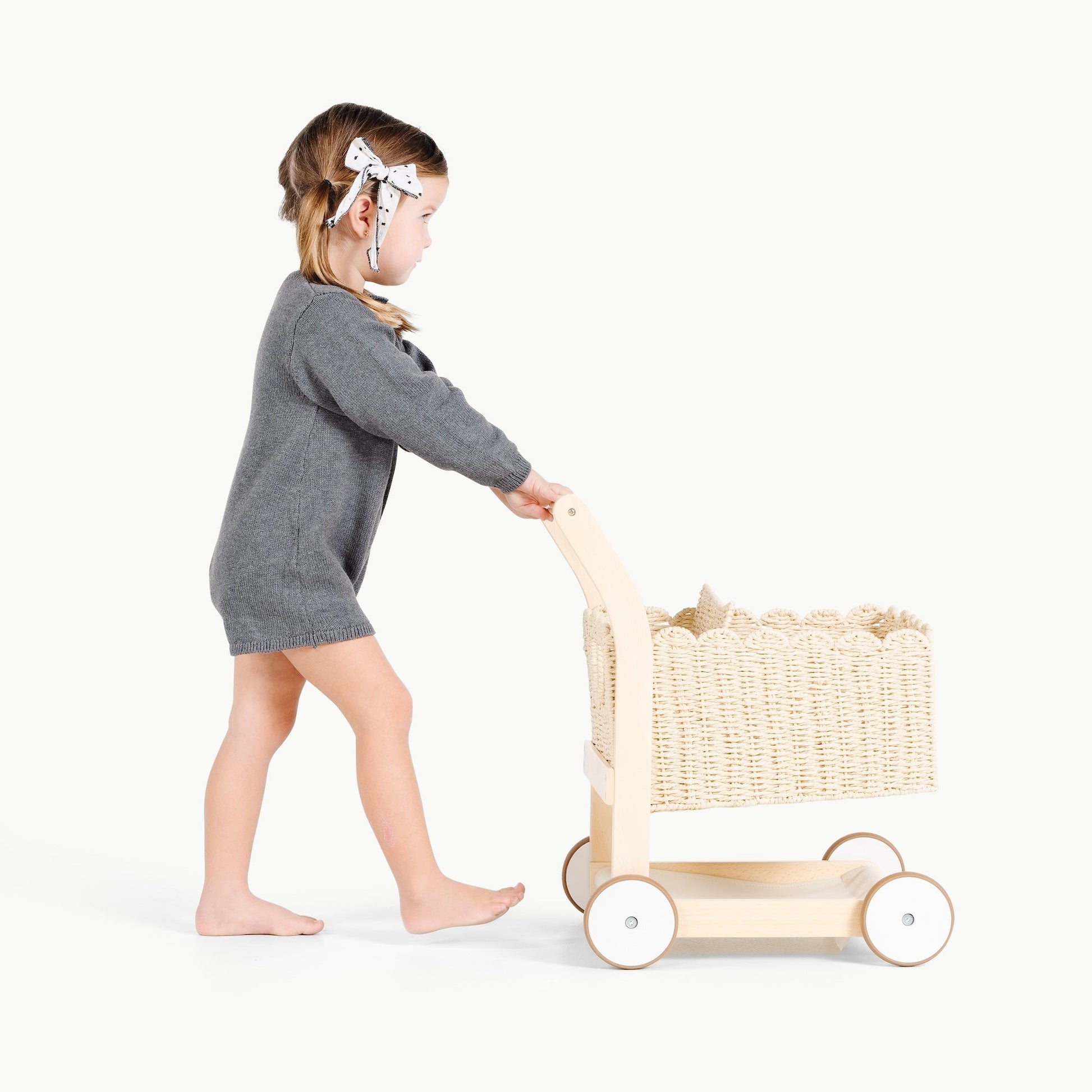 Little girl pushes Gathre Shopping Trolley