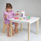 Little girl plays with Mentari Toys Ice Cream Kiosk