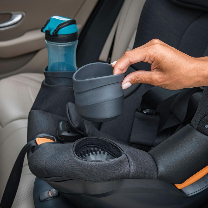 Parent removes cupholder of Chicco Fit360 ClearTex Rotating Convertible Car Seat - Black