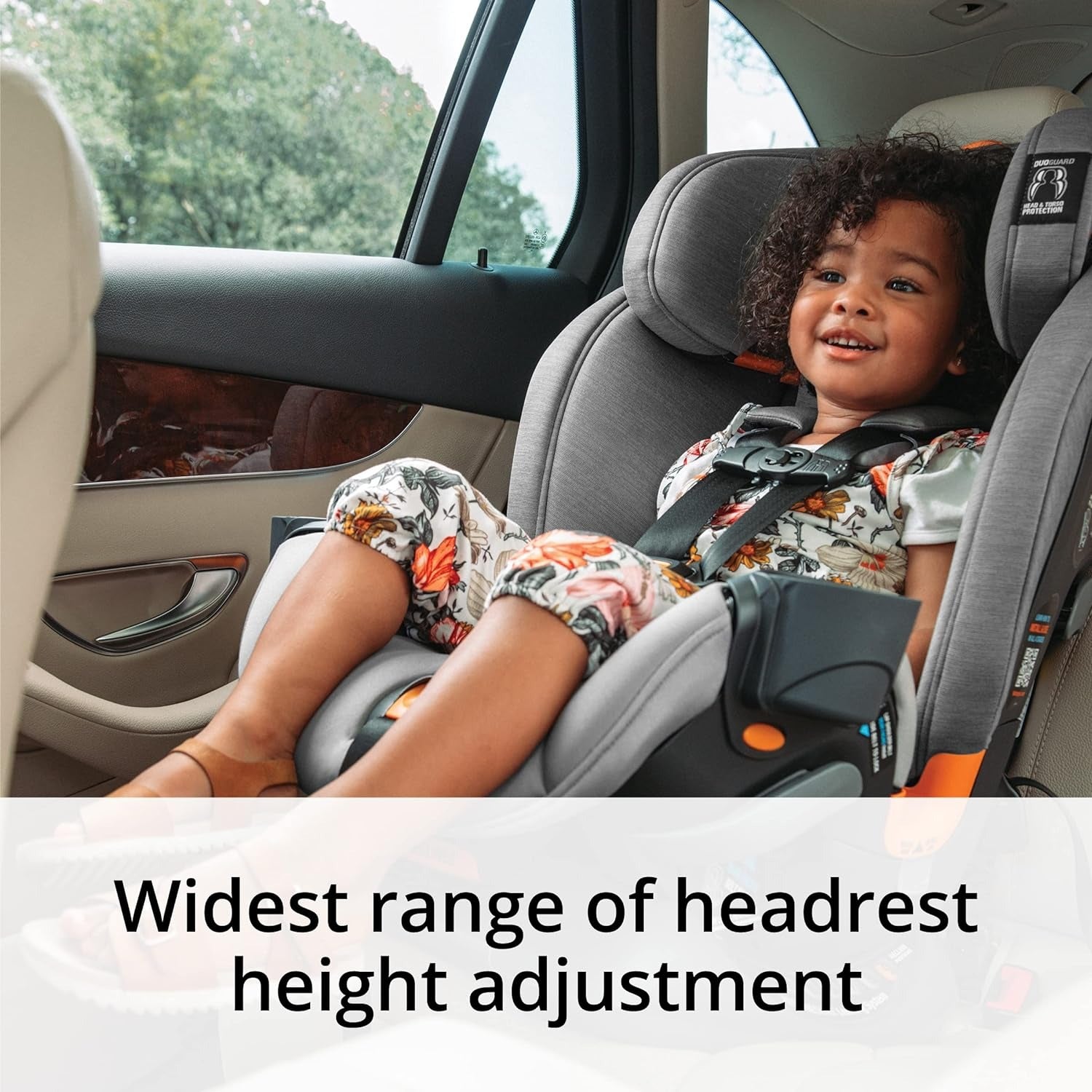 Little girl rides forward facing in Chicco OneFit ClearTex All-In-One Car Seat - Drift