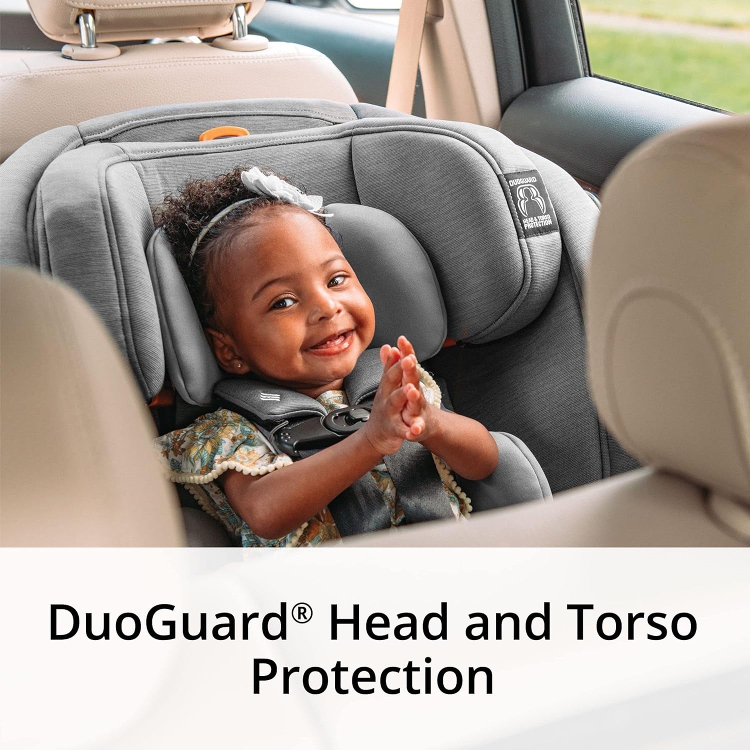 Baby rides rear facing in Chicco OneFit ClearTex All-In-One Car Seat - Drift