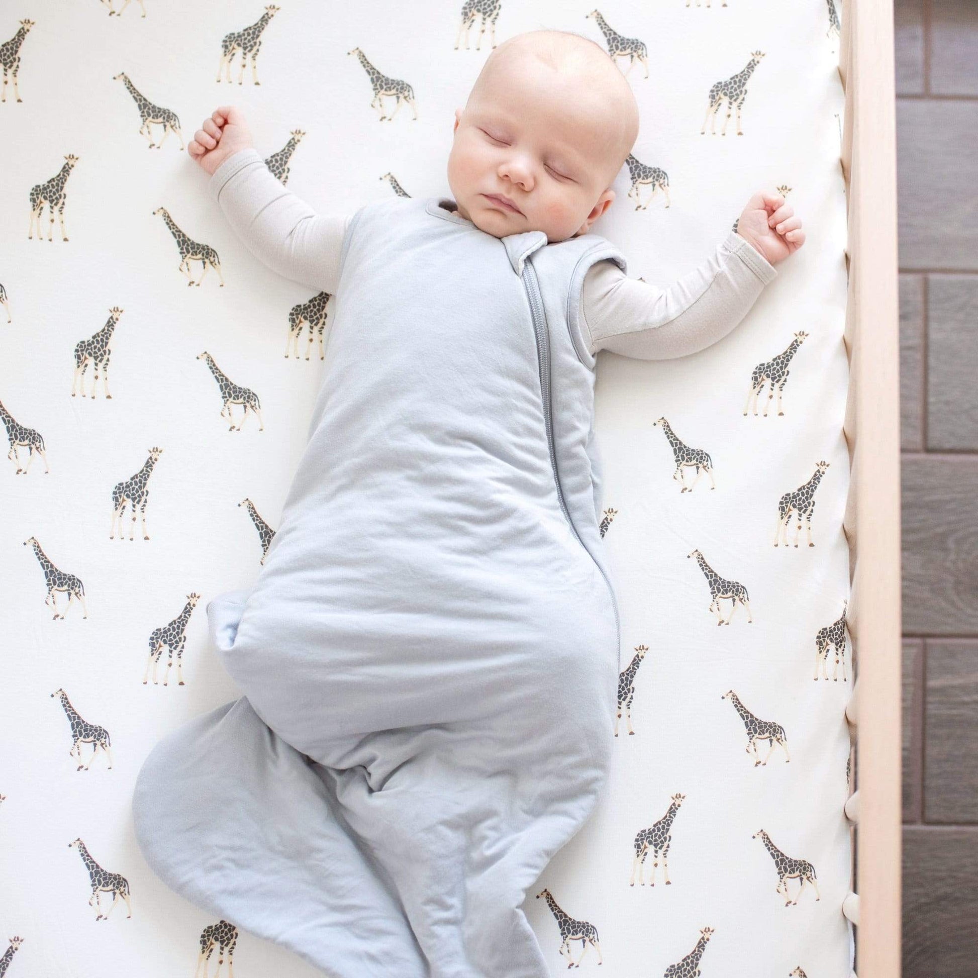 Baby wearing Kyte Baby Sleep Bag - Storm - 2.5 Tog