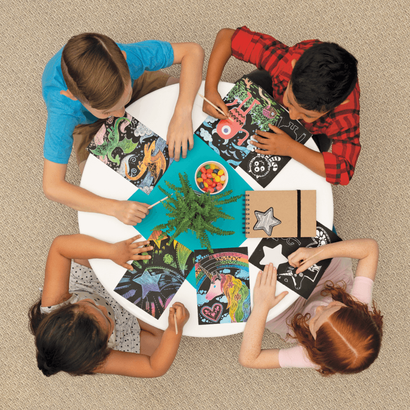Children Using OOLY Scratch and Scribble Pad