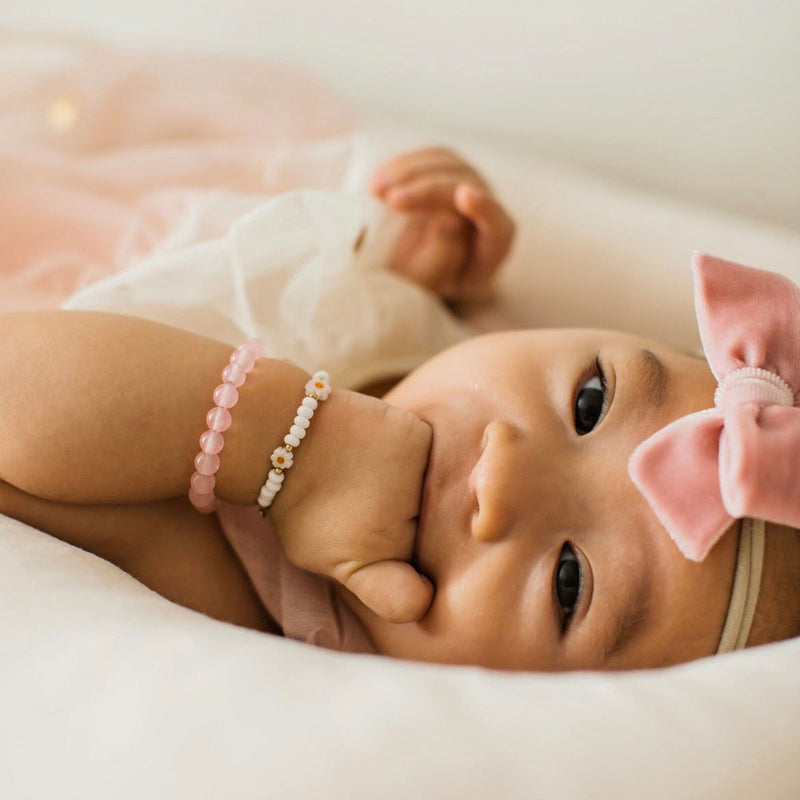 Baby wearing LittleLundsCo Bracelet - White Daisy 