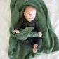 Baby laying on Saranoni Receiving Bamboni Blanket - Olive