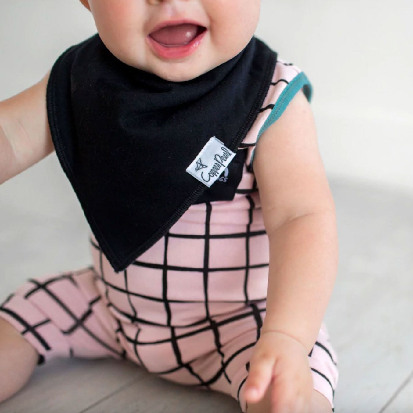 baby wearing Copper Pearl Single Baby Bandana Bib - Black